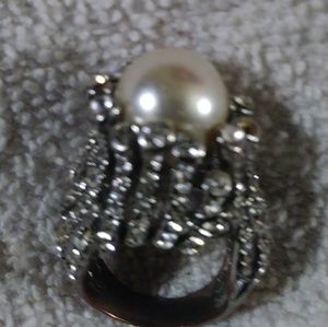 Pearl white crystal ring.